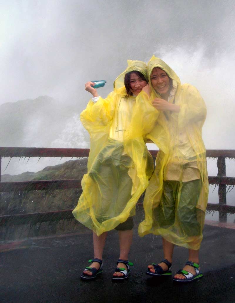 Japanease girls in the Cave of winds, Niagara Falls